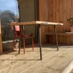 table réalisé par 2 bois et d'acier (ferronnerie ebenisterie forge à dieulefit drôme)